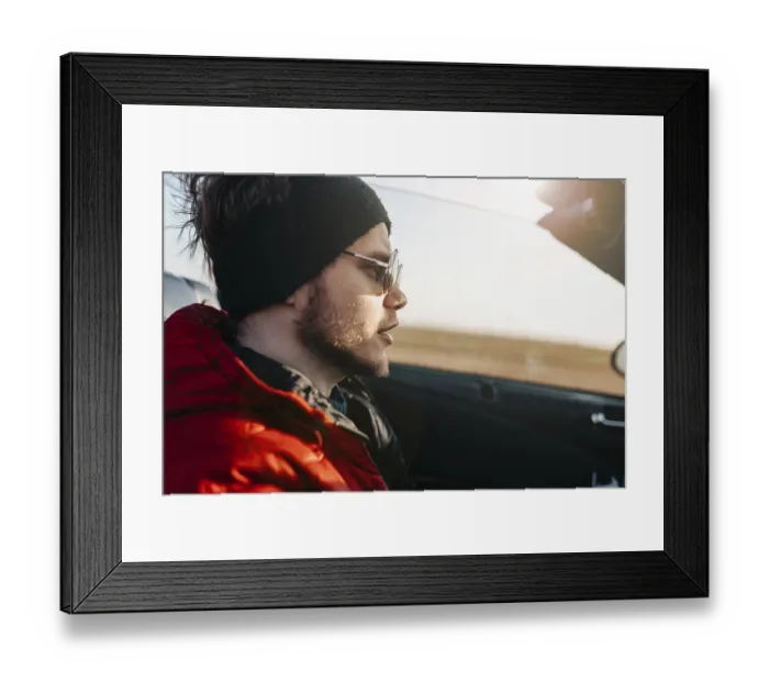 Framed Print : Side profile of a man in sunglasses in a convertible Framed Print : Side profile of a man in sunglasses in a convertible