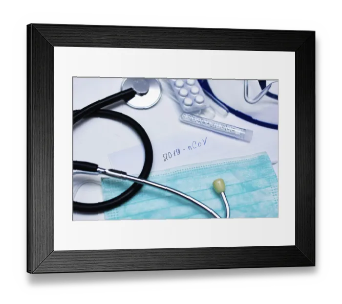 Framed Print : Stethoscope, mask, test tube labeled 2019 nCoV on a table