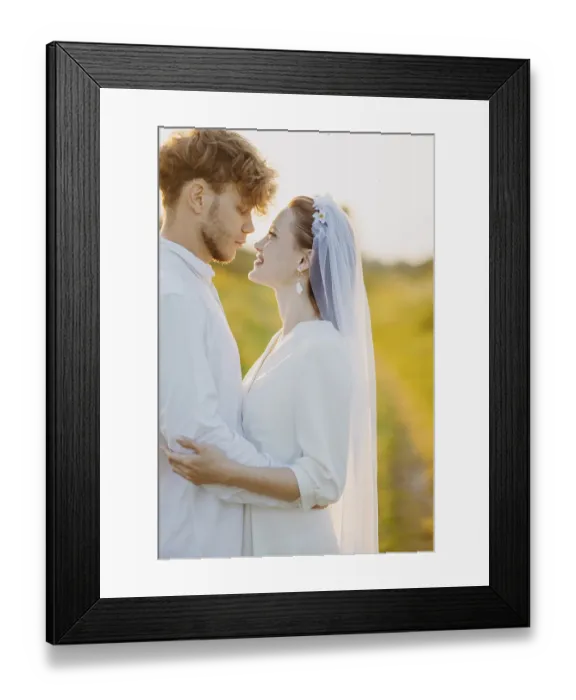 Framed Print : A couple shares a warm embrace