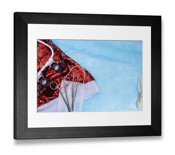 Framed Print : Surgical tools and a medical mask on red sequins against a blue backdrop Framed Print : Surgical tools and a medical mask on red sequins against a blue backdrop