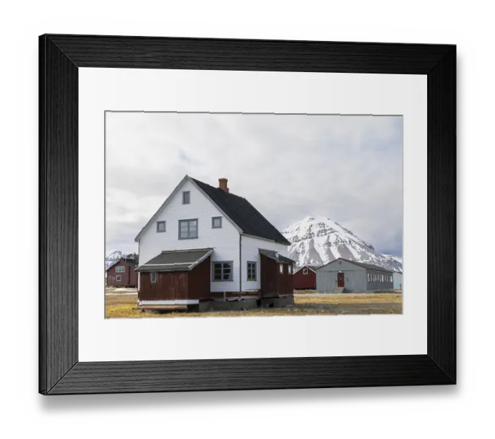 Framed Print : Wooden house in front of a mountain peak Framed Print : Wooden house in front of a mountain peak