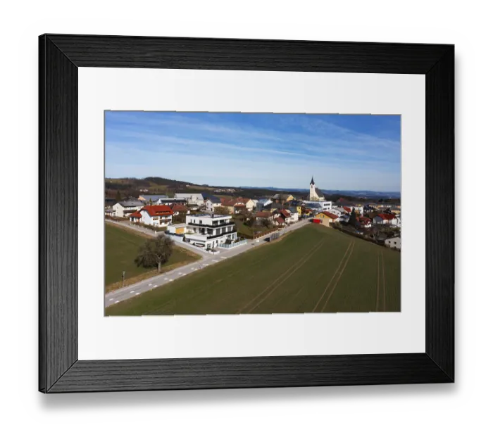 Framed Print : Drone image, view of village with parish church