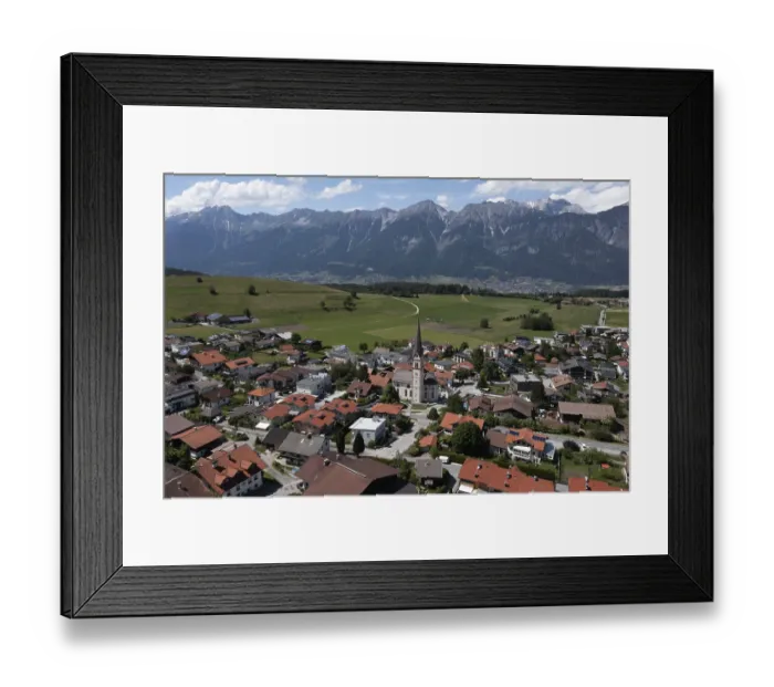Framed Print : Drone shot, view of village with parish church and Karwendel mountains