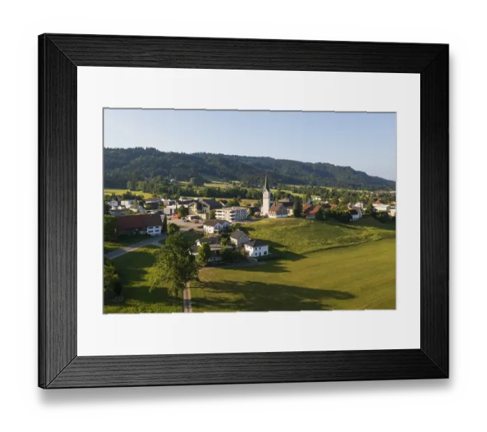 Framed Print : Drone image, view of village with parish church Framed Print : Drone image, view of village with parish church