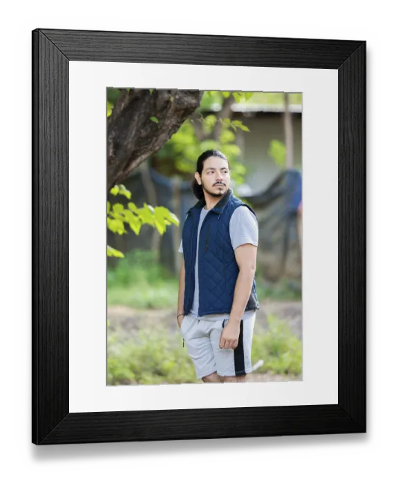 Framed Print : Portrait of a man standing looking at the horizon in the middle of nature outdoor Framed Print : Portrait of a man standing looking at the horizon in the middle of nature outdoor