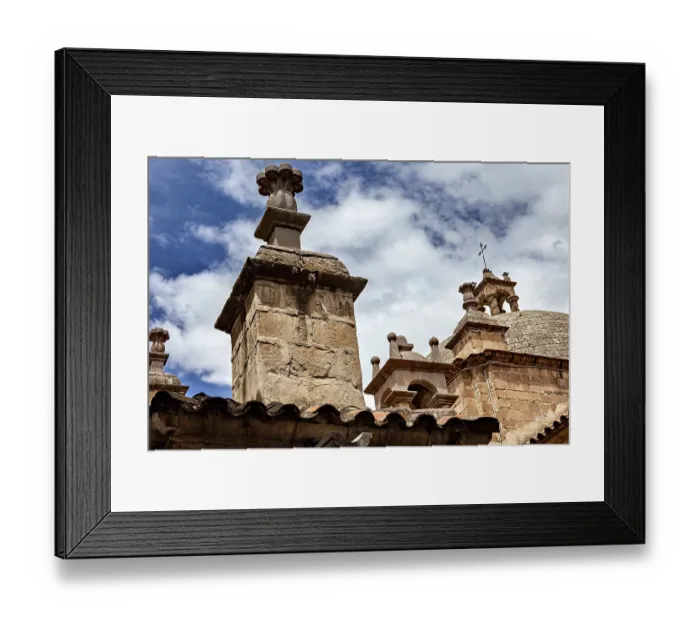 Framed Print : Architectural details of a church under a clear blue sky