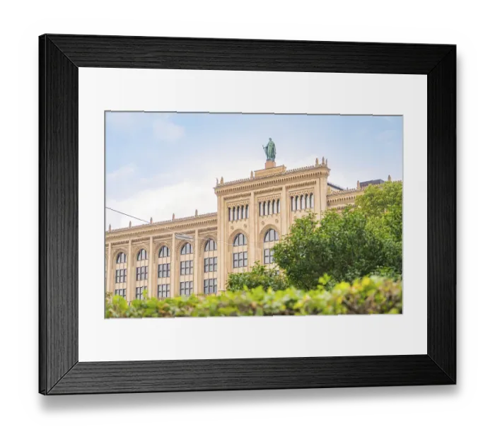 Framed Print : View of a historic building with a statue on the roof Framed Print : View of a historic building with a statue on the roof