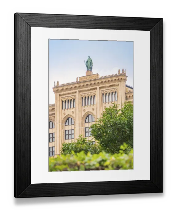 Framed Print : Large historic building with statue on the roof