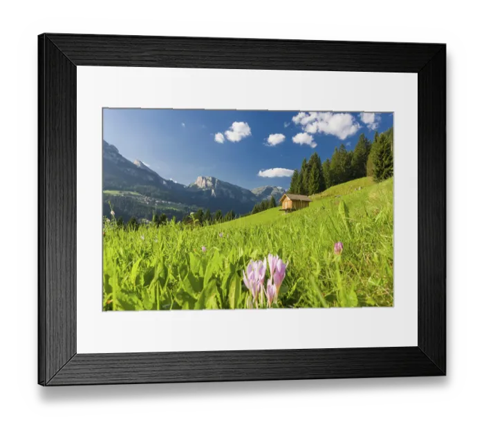 Framed Print : Summer view over fields and mountain hut in the Dolomites of the Fassa Valley