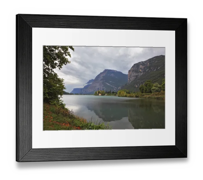 Framed Print : Toblino lake in the mountains of northern Italy and a medieval castle