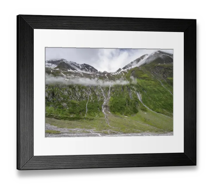 Framed Print : Mountain streams flow over steep mountain slopes into the tagl of the Schlegeisgrund