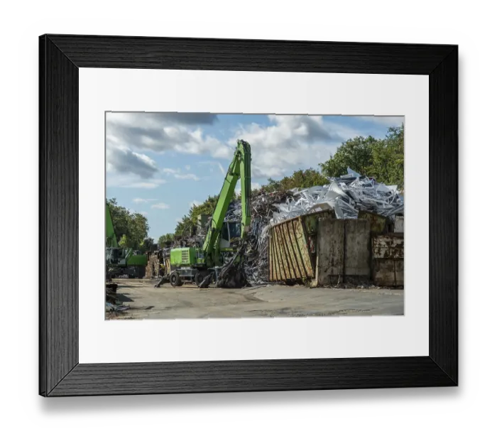Framed Print : Two green excavators working on the scrap mountain