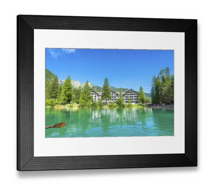 Framed Print : Wooden oar stroking emerald green water of lake braies