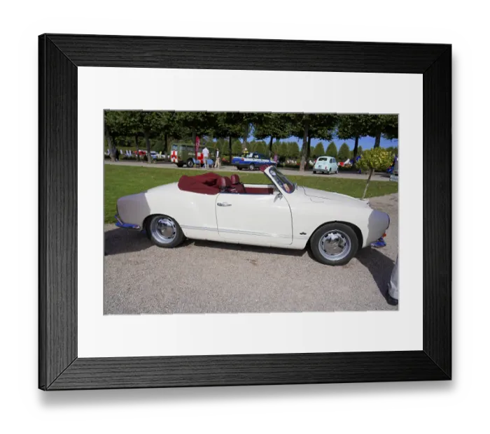 Framed Print : Side view of a white convertible at a motor show Framed Print : Side view of a white convertible at a motor show