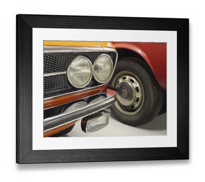 Framed Print : Two classic cars, one in orange and one in red Framed Print : Two classic cars, one in orange and one in red