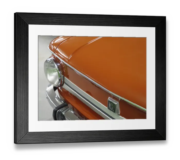 Framed Print : Front view of an orange-coloured NSU classic car with shiny details and headlights