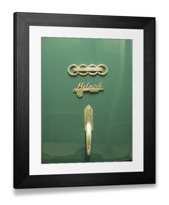 Framed Print : Close-up of a green Audi classic car with emblem and nostalgic design