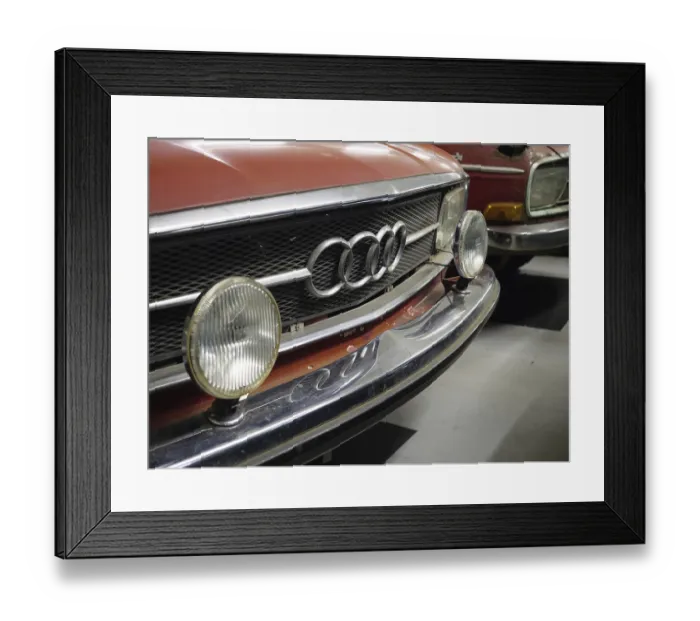 Framed Print : Close-up of a red Audi classic car with distinctive radiator grille and headlights Framed Print : Close-up of a red Audi classic car with distinctive radiator grille and headlights