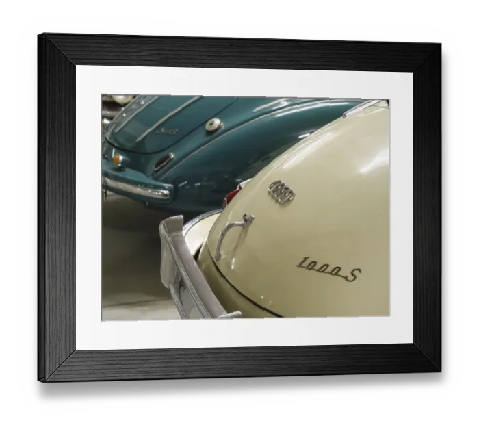 Framed Print : Detailed view of two Audi classic cars in cream and blue with chrome bumpers