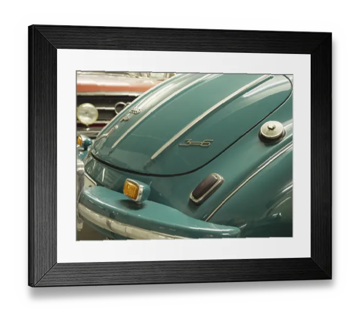 Framed Print : Close-up of a vintage car back in blue with chrome-plated bumper and details