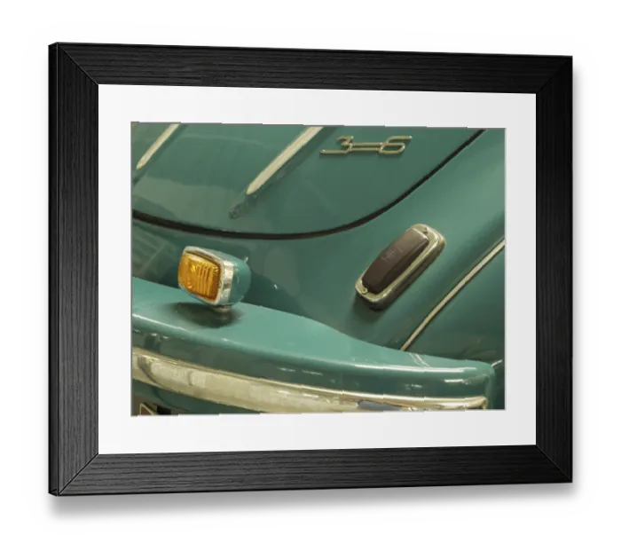 Framed Print : Detailed view of a blue vintage car with chrome accents and tail light Framed Print : Detailed view of a blue vintage car with chrome accents and tail light