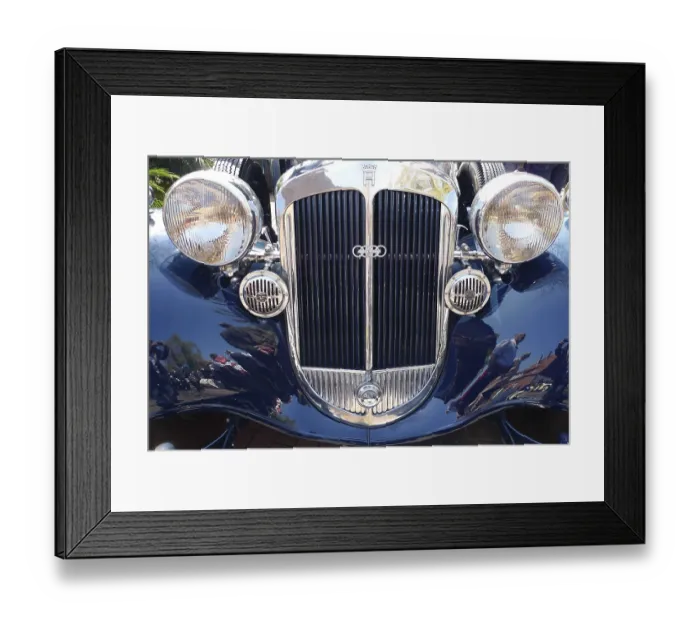 Framed Print : Front view of a classic car with double round headlights and shiny front grille Framed Print : Front view of a classic car with double round headlights and shiny front grille