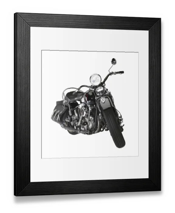 Framed Print : Angle shot of a vintage motorbike in white back