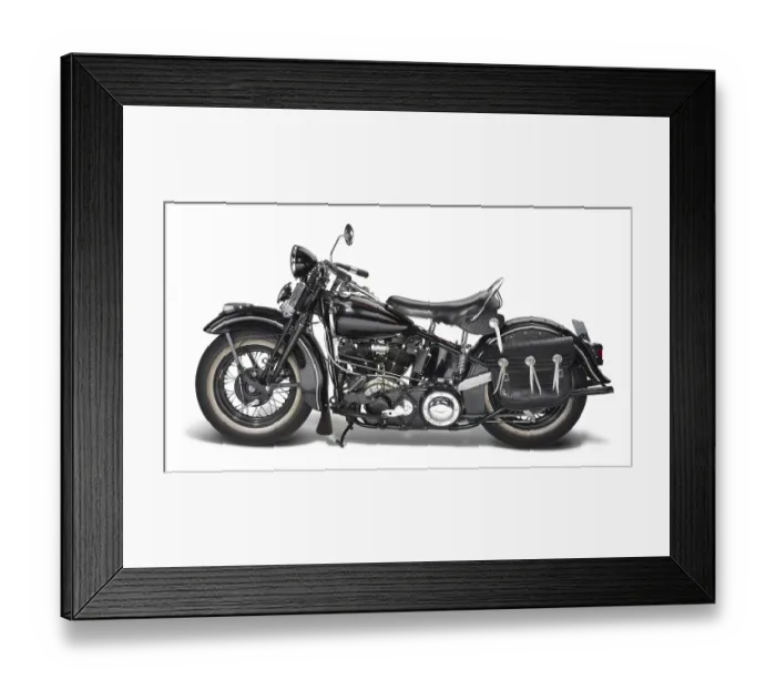 Framed Print : Sideways shot of a vintage motorbike in white back