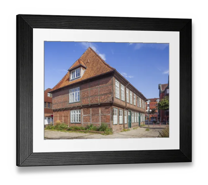 Framed Print : Historic half-timbered house in the historic centre of Harburg