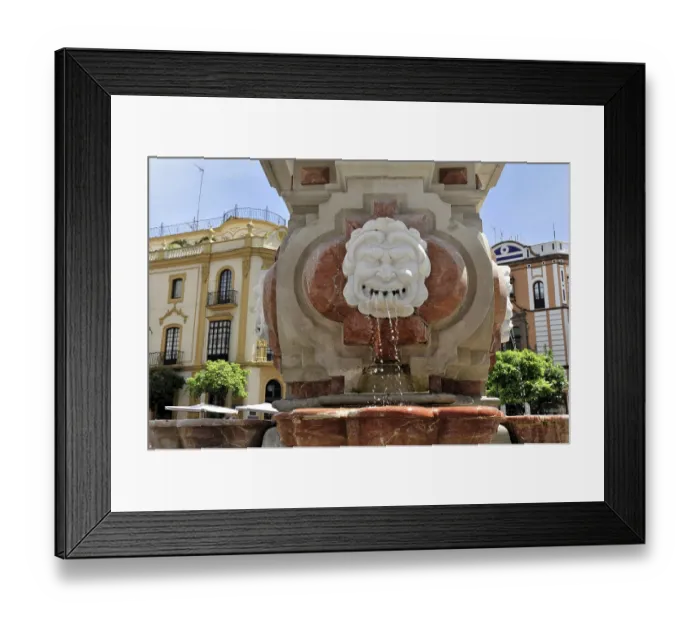 Framed Print : Seville, Marble fountain with a lion's face from which water flows Framed Print : Seville, Marble fountain with a lion's face from which water flows
