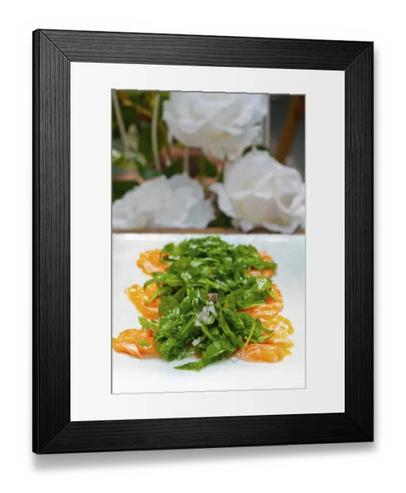 Framed Print : Fresh salmon carpaccio sushi sashimi with arugula rocket salad and caper on top