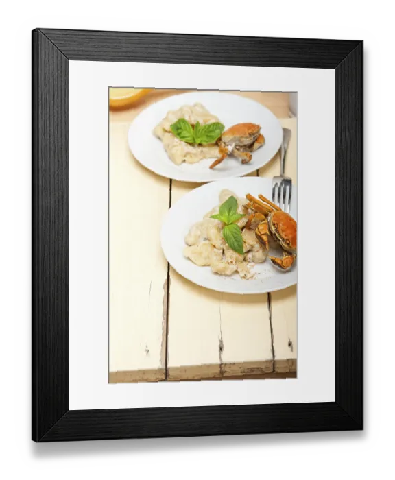 Framed Print : Fresh homemade Italian gnocchi with seafood sauce crab and basil