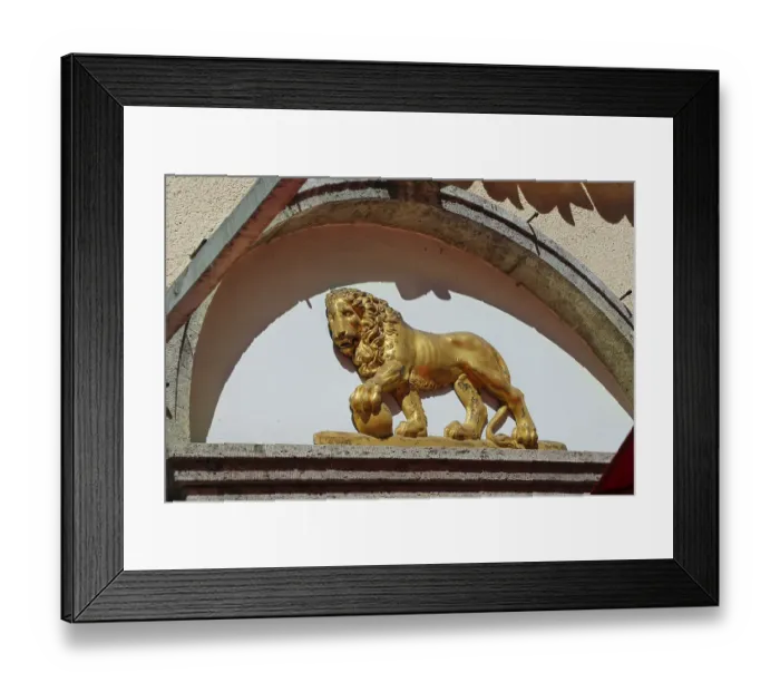 Framed Print : Golden lion, figure on facade Framed Print : Golden lion, figure on facade