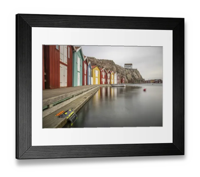 Framed Print : Small colourful houses by the sea