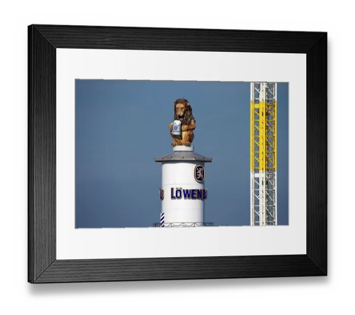 Framed Print : Oktoberfest, afternoon, Lion of the Lowenbrau brewery on the tower of the festival tent