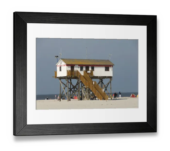 Framed Print : House on stilts on the beach, North Sea resort St