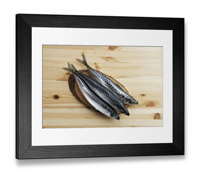 Framed Print : Frozen mackerel on wooden table