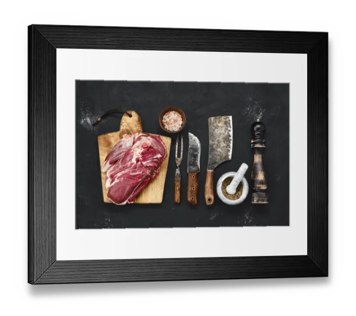 Framed Print : Overhead view of raw lamb shoulder without bone on wooden cutting board