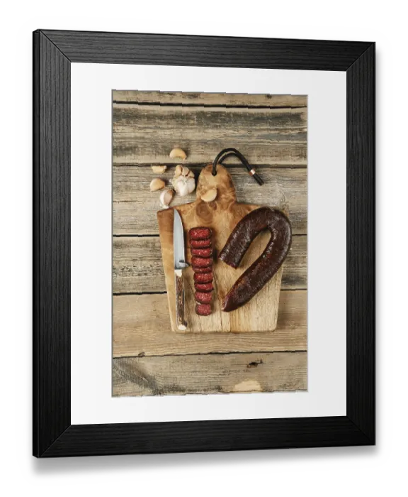 Framed Print : Top view of smoked dried beef sausage on wooden cutting board Framed Print : Top view of smoked dried beef sausage on wooden cutting board