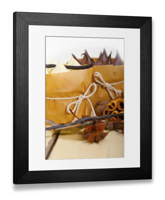 Framed Print : Fresh baked chocolate vanilla and spices cream cake dessert over rustic wood table