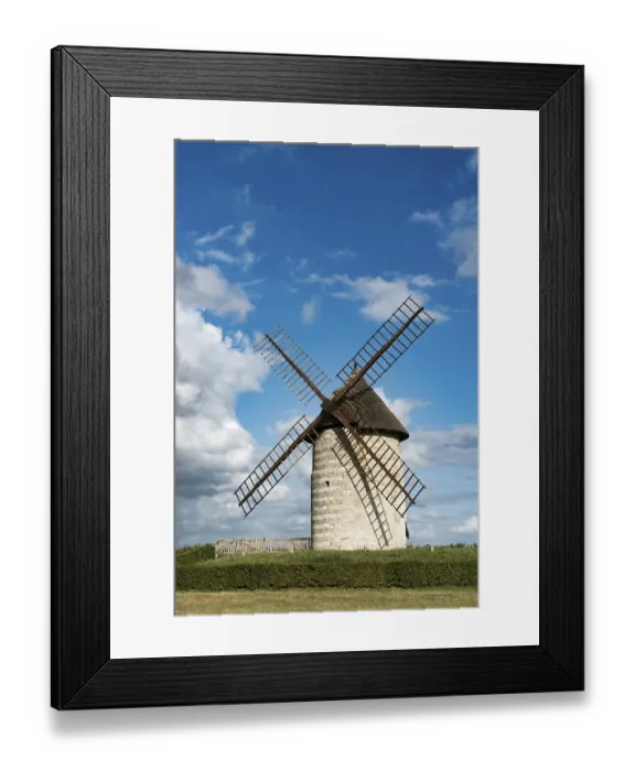 Framed Print : France - 15 August 2019: vertical view of the historic windmill Moulin de Pierre in Hauville in Normandy