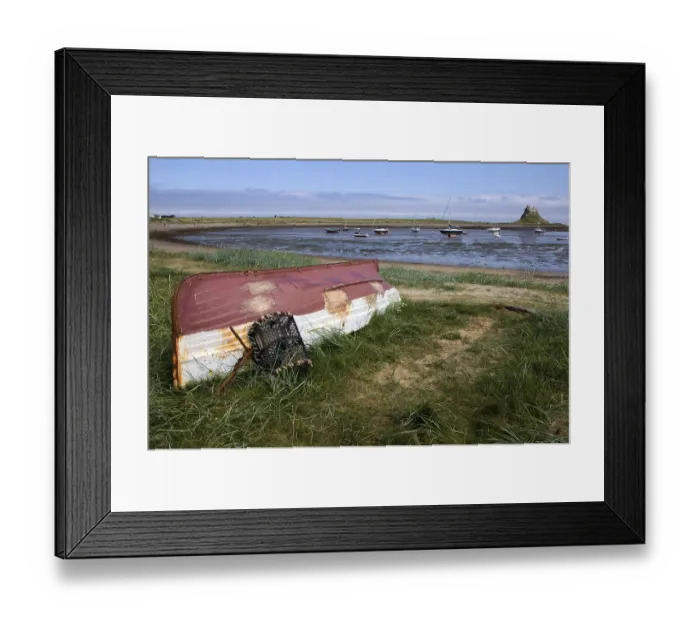 Framed Print : Upturned Rowing Boat on Holy Island