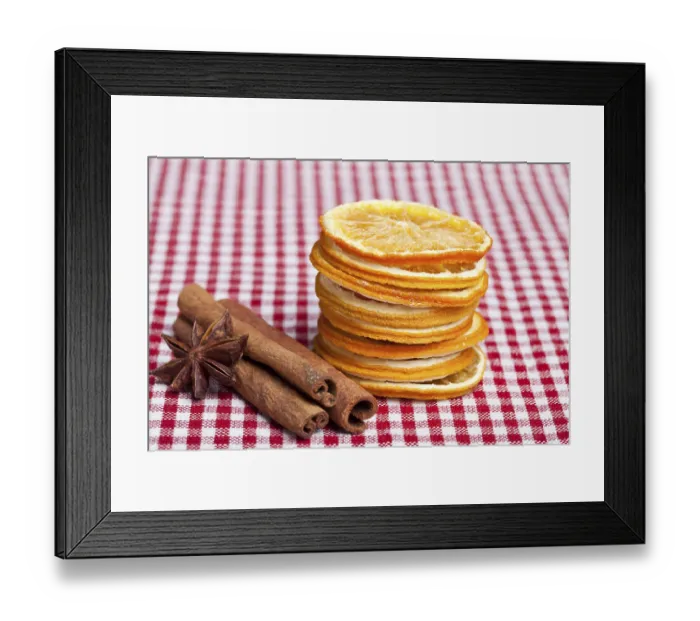 Framed Print : Orange, cinnamon and aniseed on a chequered cloth