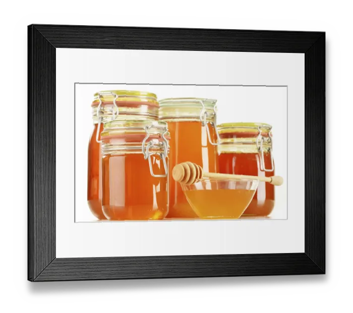 Framed Print : Composition with jars of honey isolated on white background Framed Print : Composition with jars of honey isolated on white background