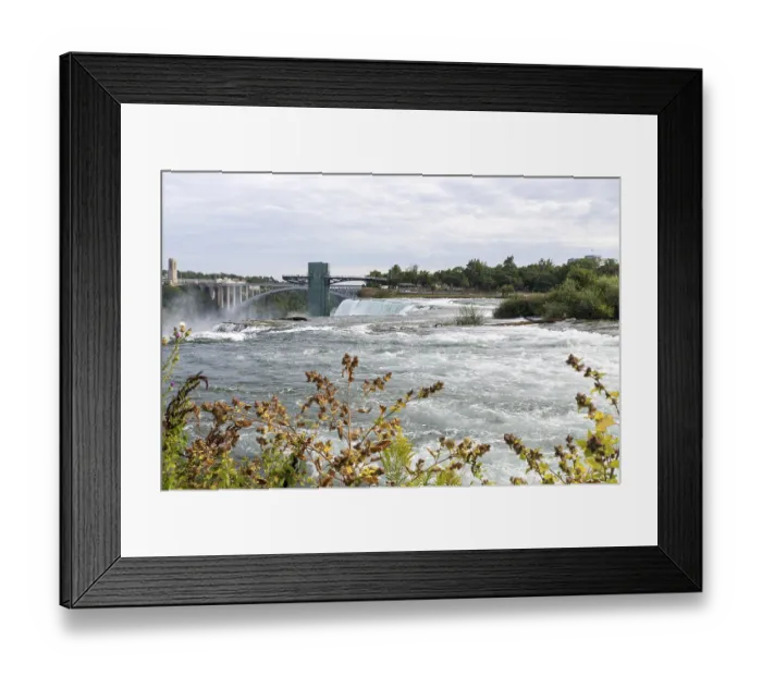 Framed Print : Niagara Falls is the collective name for three waterfalls that straddle the international border between Canada