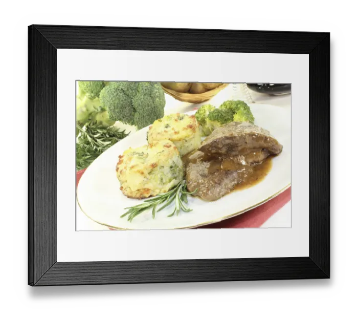 Framed Print : Venison medallions with potato gratin and broccoli against a light background Framed Print : Venison medallions with potato gratin and broccoli against a light background