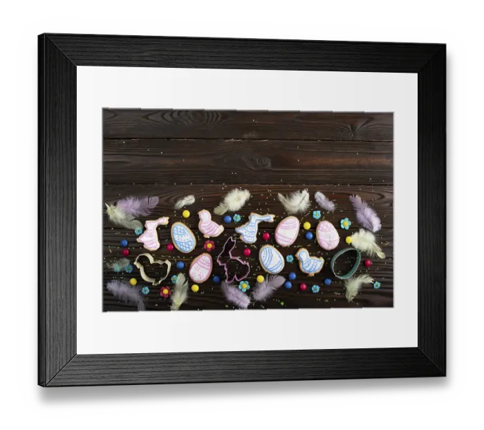 Framed Print : Cookie cutters feathers and Easter frosted cookies in shape of egg