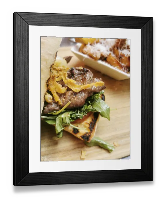 Framed Print : Delicious sandwitch with cooked slices of pork steak onions and vegetables