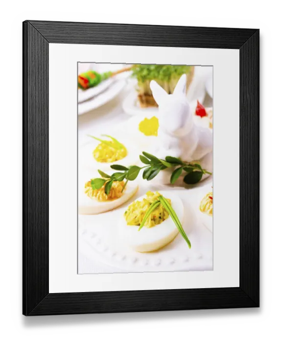 Framed Print : A colourful and festive Easter table decoration Framed Print : A colourful and festive Easter table decoration