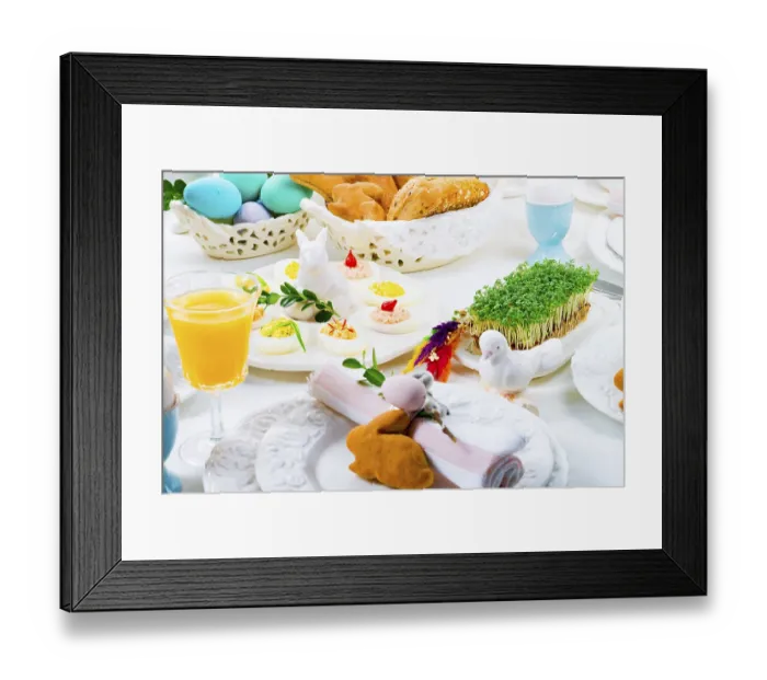 Framed Print : A colourful and festive Easter table decoration